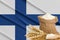 Finlandia grain crisis, Concept global hunger crisis,  On background Flag Finlandia wheat grain. Concept of growing wheat in