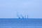 Finnish Gulf near Petersbourg in the cloudy summer day. View on the thermal power station