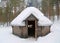 Finnish Kota in a snow-covered landscape