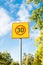 Finnish speed limit sign 30 km h on blue sky background