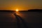 Finnish winter landscape with yellow sunset.