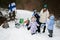 Finnish woman and kids with Finland flags on a nice winter day. Nordic Scandinavian people