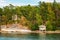 Finnish Wooden Bath Sauna Log Cabin On Island In Summer