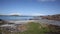 Fionnphort port Isle of Mull Scotland UK view to Iona island pan