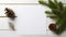 fir branches and a white paper blank on a white wooden table, the essence of a nature-themed New Year concept