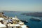 Fira village roofs and boats