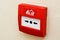 Fire alarm button on wall