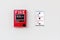 Fire Alarm and Firefighter\'s Phone Socket on white Concrete Wall