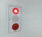 A fire alarm white panel with emergency fire push button in red a cirular shape buzzer and red light warning