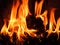 Fire in black background. Flames and burning sparks close-up