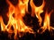 Fire in black background. Flames and burning sparks close-up