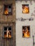 Fire bursts through two windows