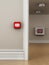 Fire button, smoke detectors and hose on the wall. 3D illustration