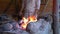 Fire crackling in blacksmith workshop of forging metal. Anonymouse craft smith create objects from wrought iron or steel