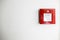 Fire detection button on wall