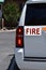 Fire emblem sign on a the truck of a Fire Department Chief