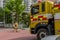 Fire engine on narrow crowed city street