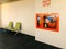 Fire equipment, fire equipment in the red cabinet next to the common room wall, red fire extinguisher, and the symbol of fire exti