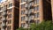 Fire escape ladder outside residential brick building in San Diego city, USA. Typical New York style emergency exit for