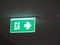 Fire escape sign on the ceiling fire exit arrow symbol