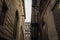 Fire escape stairs and ladder, in metal, on a typical North American old stone building from the Old Montreal, Quebec, Canada