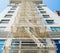 Fire escape on tall building viewed from below