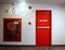 Fire exit emergency door red color metal material.