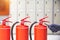 Fire extinguisher has hand engineer inspection checking pressure gauges to prepare fire equipment for protection and prevent in