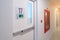 Fire extinguisher system on the wall with Fire Exit door sign for emergency. Stairwell fire for escape in building or apartment