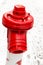 Fire extinguishing system hydrant metallic red close-up adapter for hose against a background of snowy area