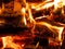 Fire glow wallpaper background. Burning wood.