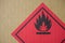 Fire hazard symbol on a cardboard box