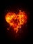 Fire heart on black background. Burning gas texture.