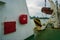 Fire hose cabinet and rescue motor-boat in the ferry ready for action