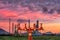 Fire hydrants and oil refinery plant blur background.