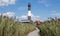 Fire Island Lighthouse looking east with boardwalk and beach grass