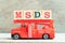 Fire ladder truck hold block in word MSDS Abbreviation of material safety data sheet on wood background
