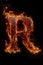 Fire letter R made of burning letters on black background