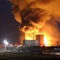 Fire at a nuclear power plant, clouds of smoke, fire, disaster, dangerous situation,