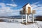 Fire observation tower surrounded with snow