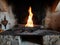 Fire in an open ancient fireplace in a wooden antique stone house