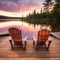 Fire Pit Flames Glowing on a Cottage Dock at Sunset with Sunlight Reflected on the Tranquil Water