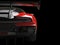 Fire red sports car - rear wing closeup shot