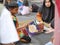 Fire refugee children learning to read books in the afternoon