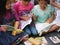 Fire refugee children learning to read books in the afternoon