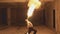 Fire show artist breathe fire in the dark, slow motion