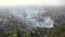 Fire smoke in the residential blocks in Almaty, Kazakhstan. Looking down aerial view of Almaty