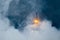 Fire sparkler in dense smoke, abstract Christmas firework background