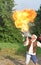 Fire spitting juggler