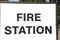 fire station sign writing caption text words in black on white background. ph